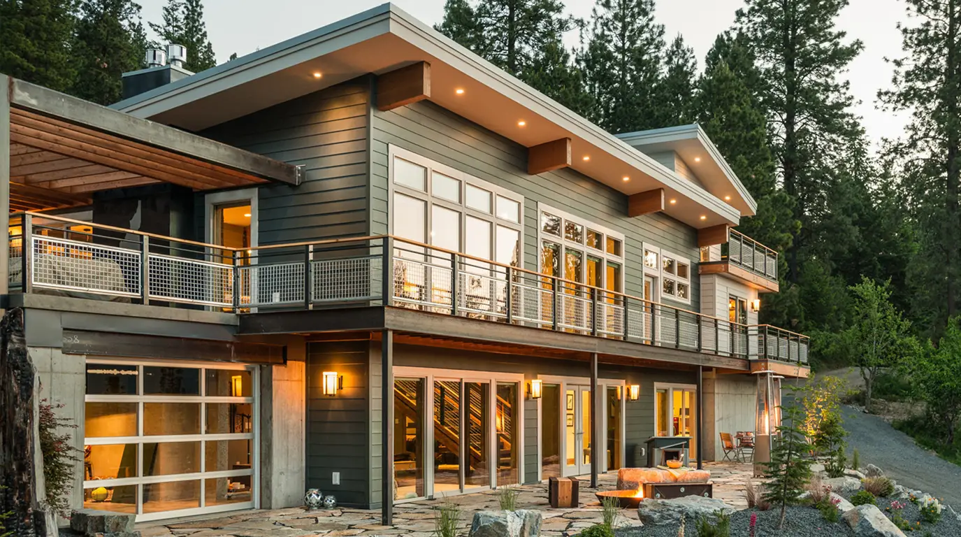 James Hardie fiber cement siding on Evergreen mountain home with snow-capped peaks